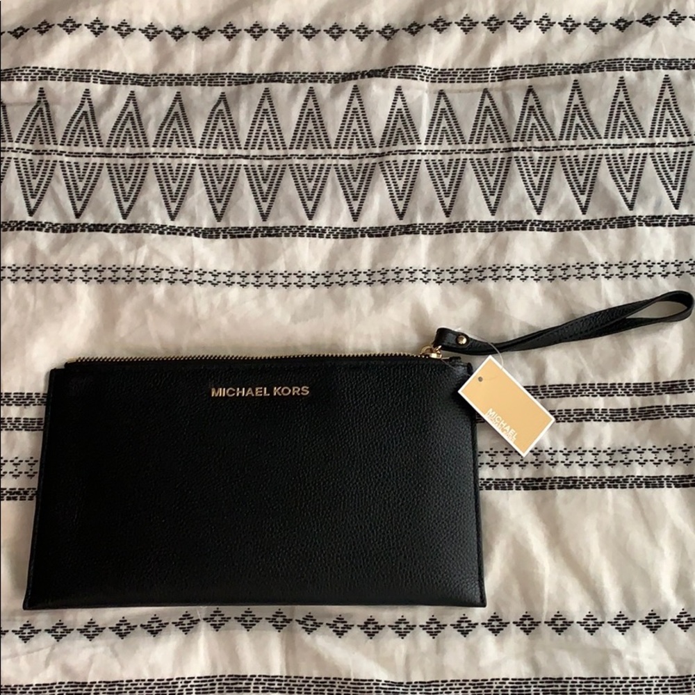 Brand New with tags  Michael Kors wristlet/wallet